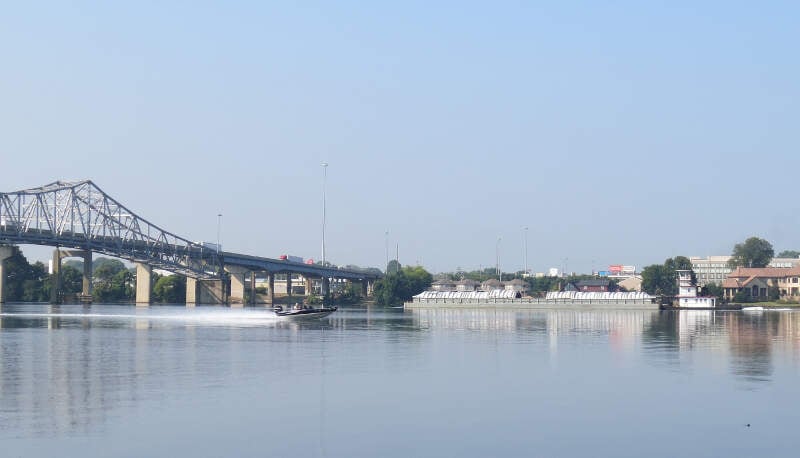 Tug And Boat At Bridge