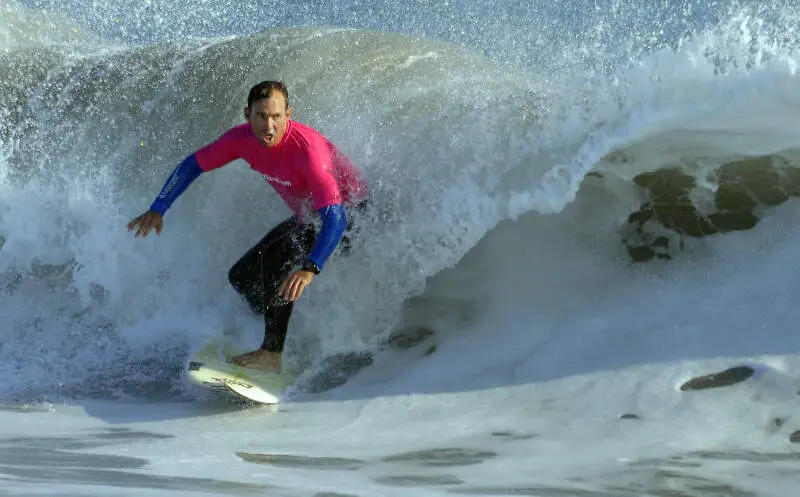 Us Navy N M Jefferey Easson Rides A Wave Off Of Point Mugu During The First Naval Base Ventura County Surf Contest