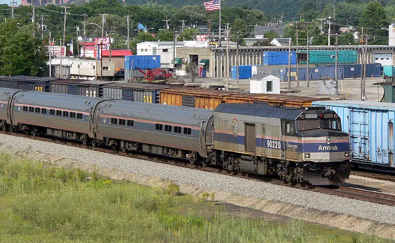 Passenger Trains And Freight Trains At Rigby Yard