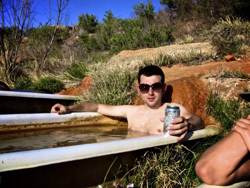 German Tourist Enjoying Mystic Hot Springs Bathtubs